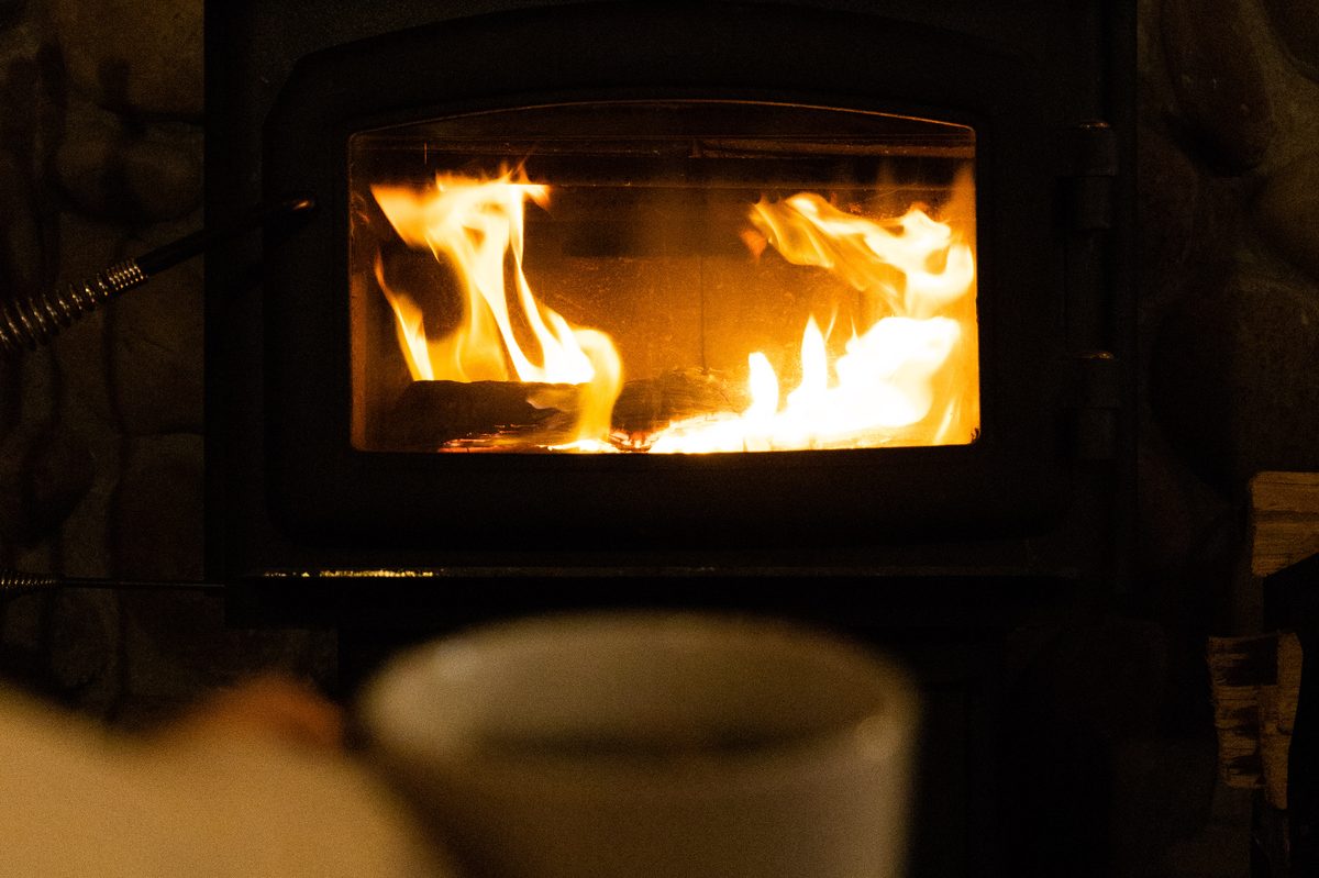 Cozy fireplace with coffee — perfect for a winter Hood Canal retreat