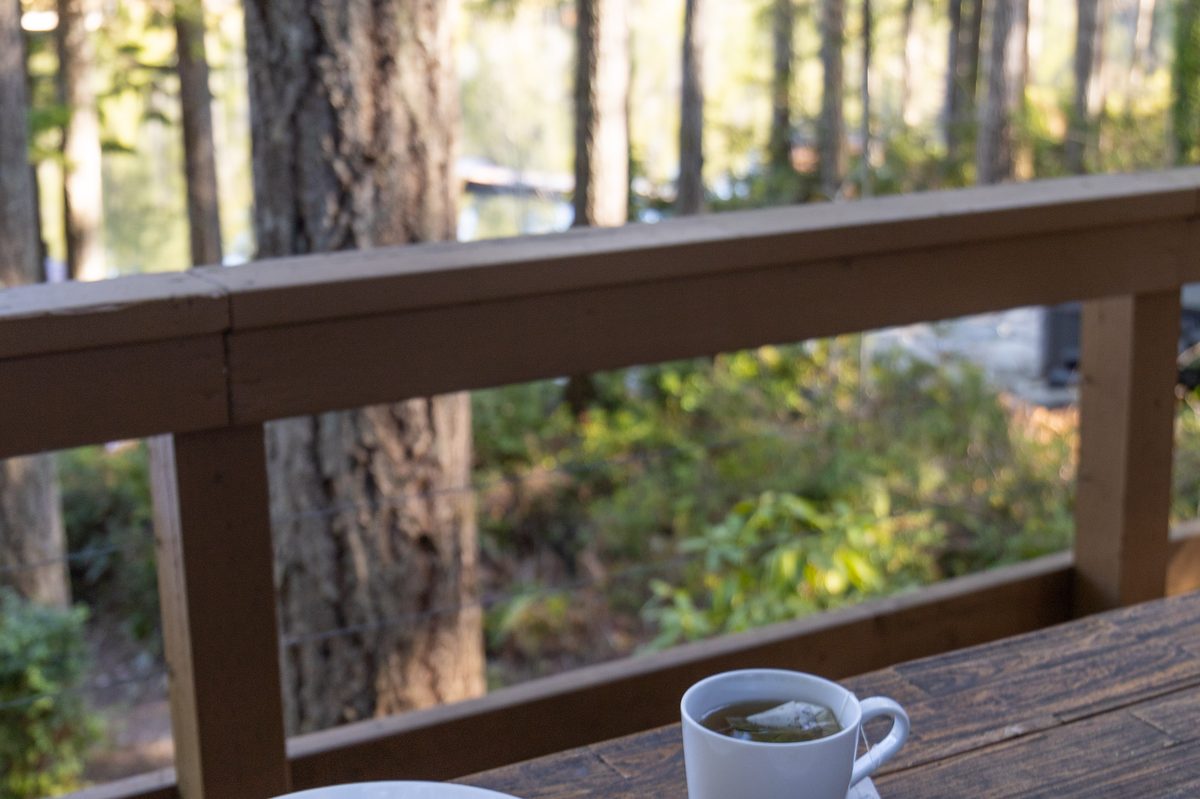Waterfront dining with Hood Canal views — outdoor table overlooking the water