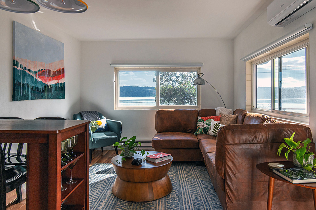Bright living area with updated furnishings and natural light