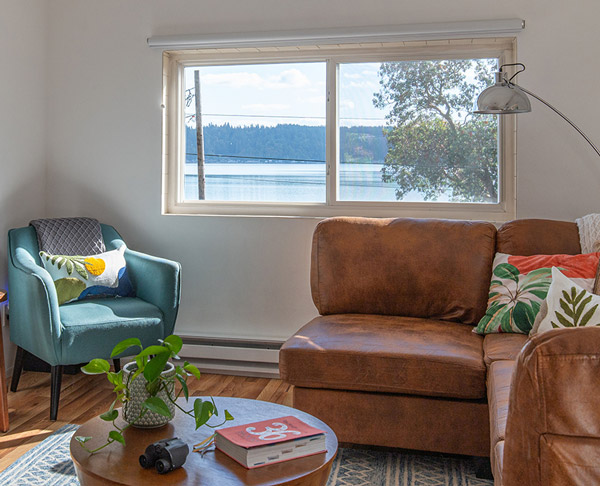 Luxury king bedroom at The Lounge with premium hotel-quality linens and water views
