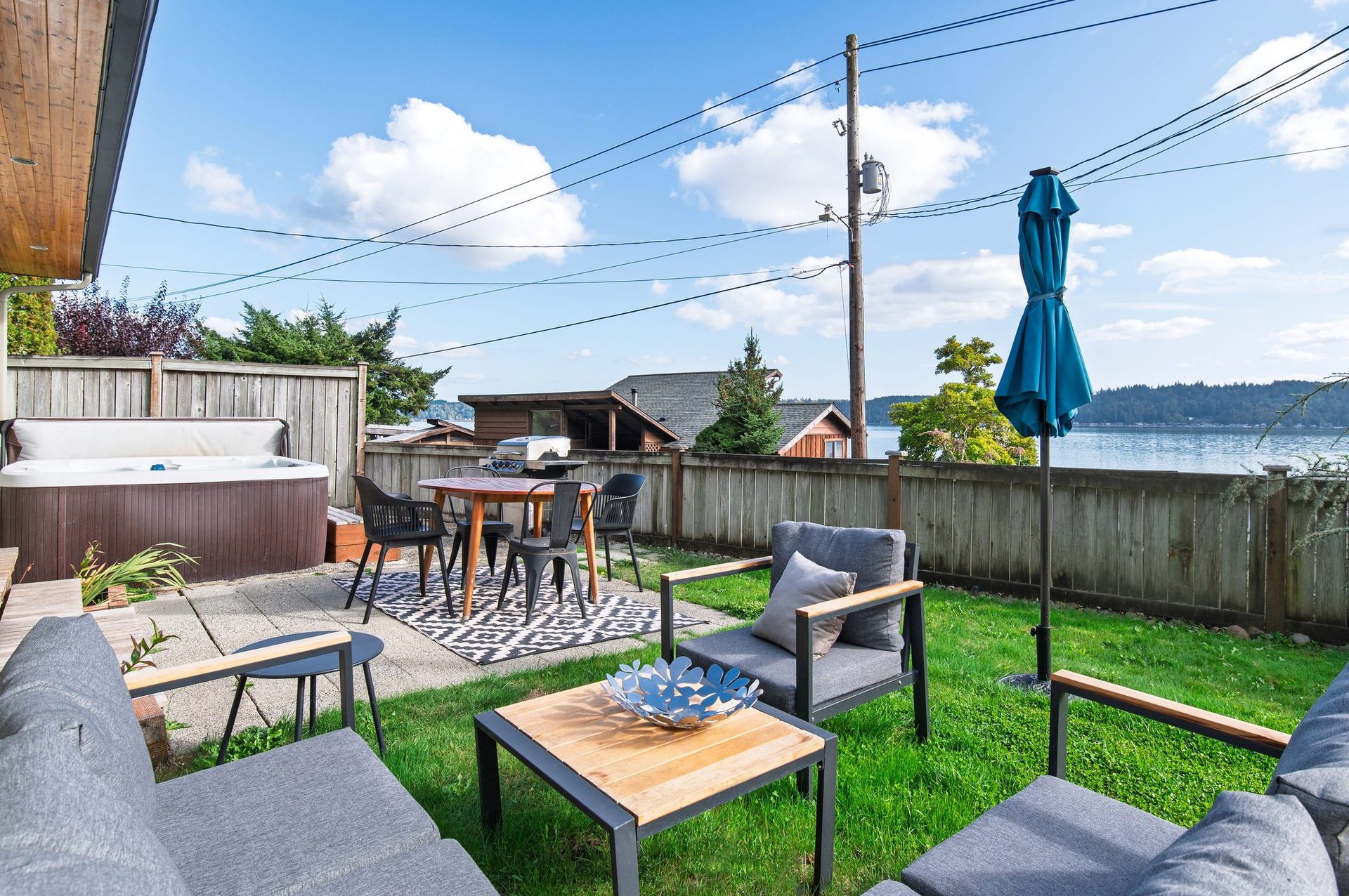 Outdoor seating area overlooking Hood Canal at The Horizon
